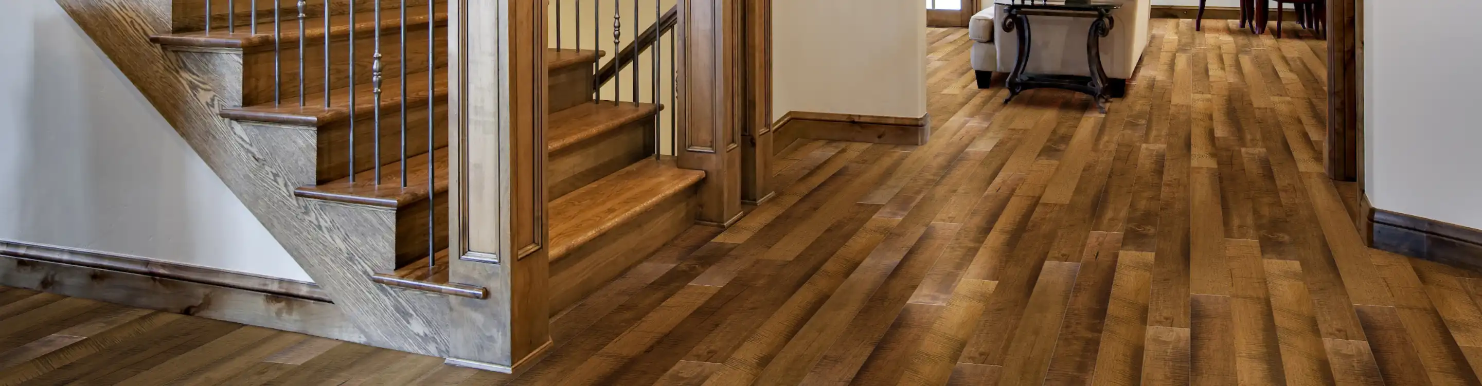 Dark hardwood flooring with stairs 